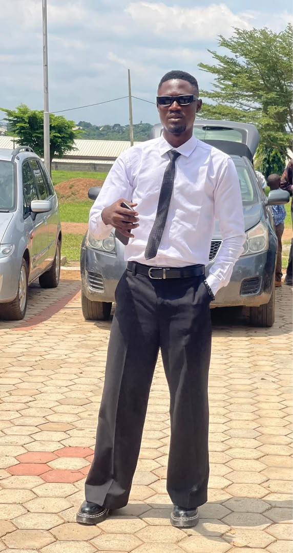 AY Black Men Fashion World tailor at work